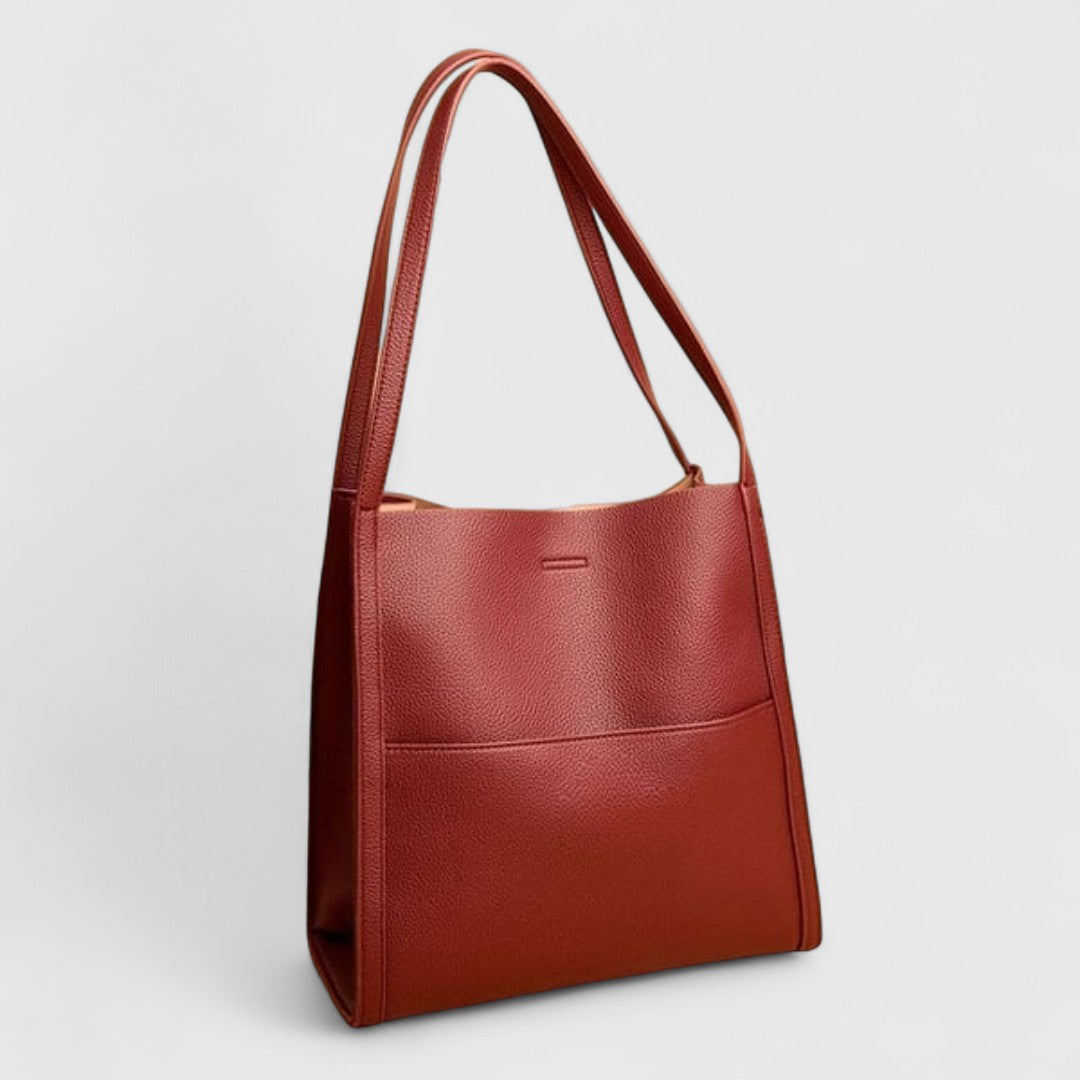 Plousia - Borsa a tracolla in pelle dal design semplice ed elegante